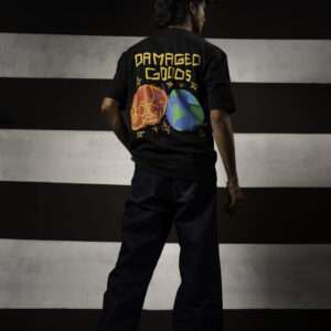 Oversized beige cotton t-shirt with Damaged Goods signature graphic, streetwear style